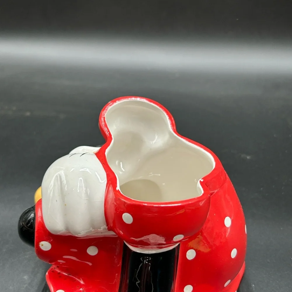 Disney Minnie Mouse Ceramic Collectible with Red and Black Accents cookie jar